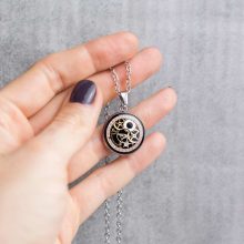 Unisex steampunk necklace from the Mechanicalist collection, handmade with vintage watch parts