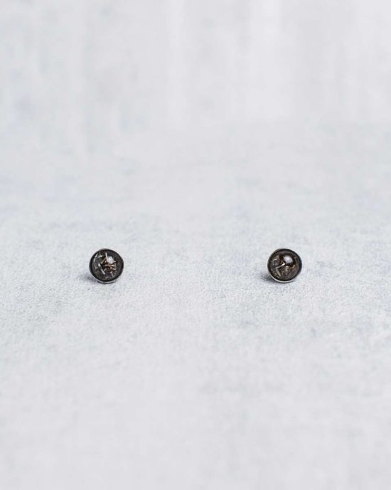 Handmade steampunk stud earrings arranged from random vintage watch parts