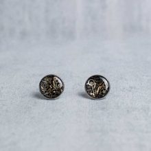 Silver steampunk stud earrings with layered mechanical components.
