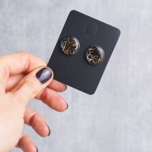 Silver steampunk stud earrings made from authentic watch parts.