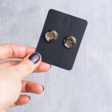 Silver mechanical earrings with gears and reclaimed watch parts.