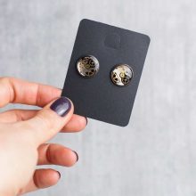 Silver mechanical earrings with gears and reclaimed watch parts.