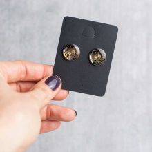 Silver mechanical earrings with gears and reclaimed watch parts.