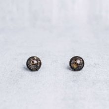 Handmade steampunk earrings with various vintage watch parts