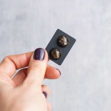 Handmade steampunk earrings with various vintage watch parts