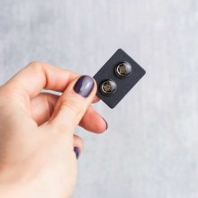 Silver mechanical earrings with gears and reclaimed watch parts.