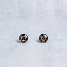 Handmade silver steampunk earrings with reclaimed watch parts.