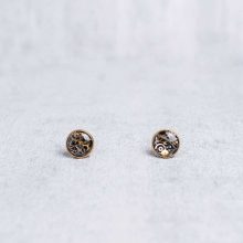 Gold mechanical earrings with tiny watch gears