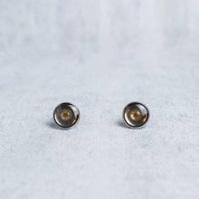 Handmade silver steampunk earrings with reclaimed watch parts.