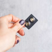 Silver mechanical earrings made from authentic watch components.