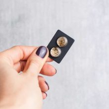 Unique silver steampunk earrings made with assorted watch parts.