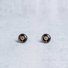 Handmade silver steampunk earrings with mechanical watch parts.