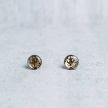 Silver steampunk stud earrings made from authentic watch parts.