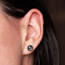 Silver minimalist steampunk earrings worn on ear, 6mm