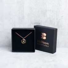 Unique steampunk necklace with genuine watch mechanisms in a jewellery box